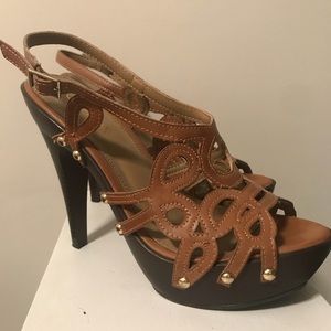 Icora size 7.5 tan heel.